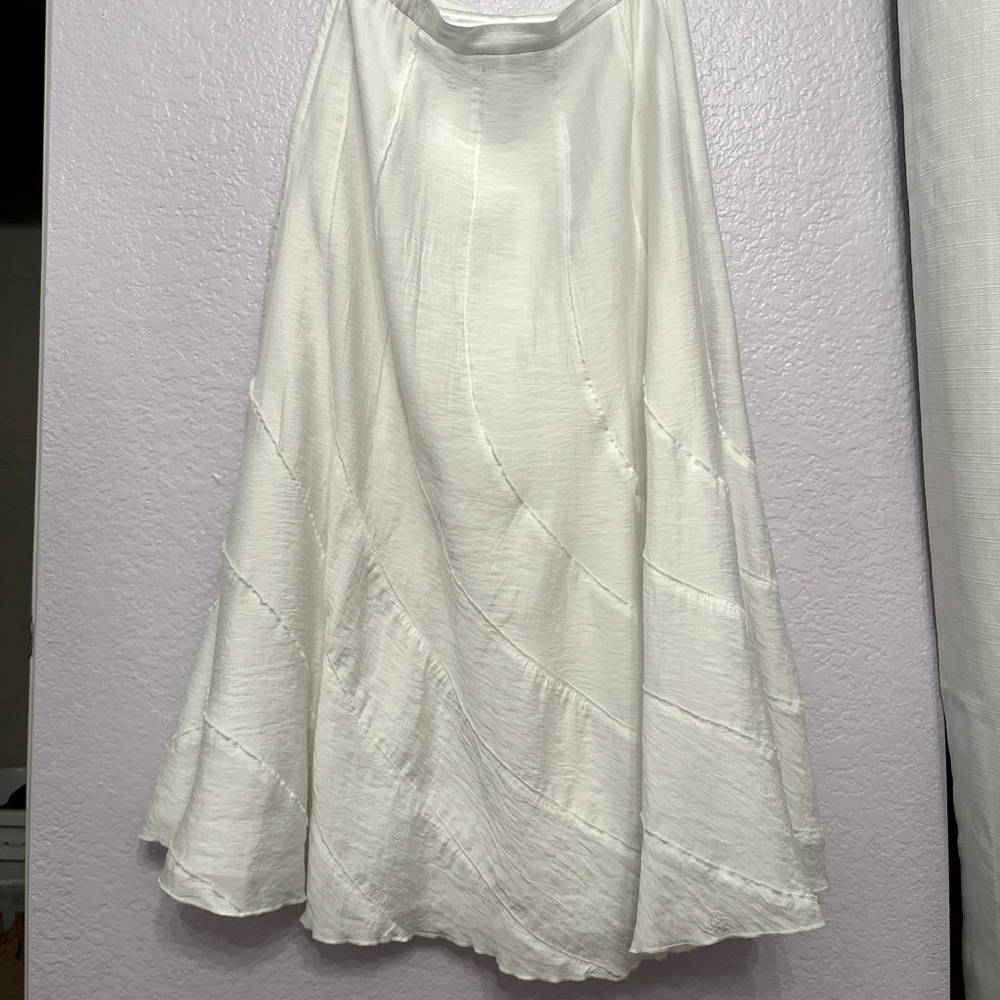 Excellent used condition Chico’s long fully lined skirt. Sz 0 or a med. sz 6.